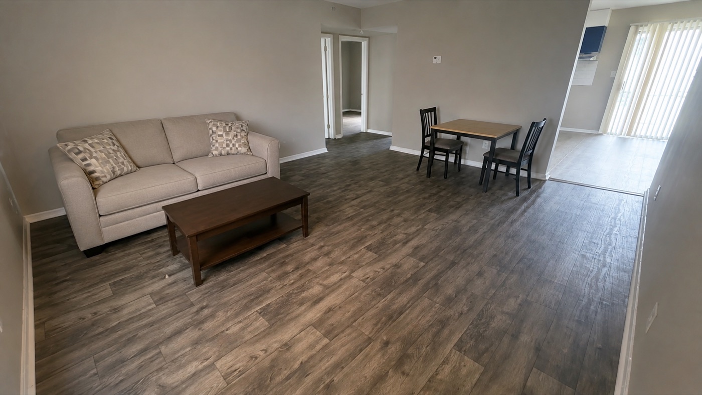 Lightly staged living and dining room